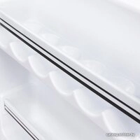 Однокамерный холодильник Tesler RC-95 (коричневый)